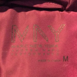 Sleeveless burgundy zip front puffer jacket